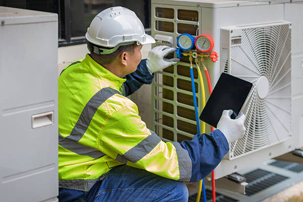 Professional Air Duct Cleaning technician working in Louisburg, NC